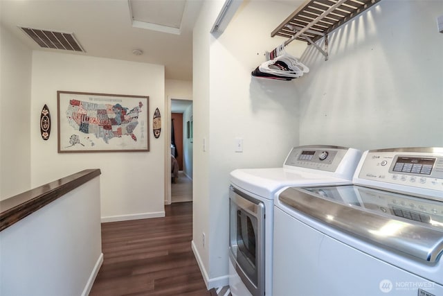 6530 Newaukum Pl NE, Bremerton, WA 98311 - washroom with washing machine and clothes dryer and dark wood-type flooring