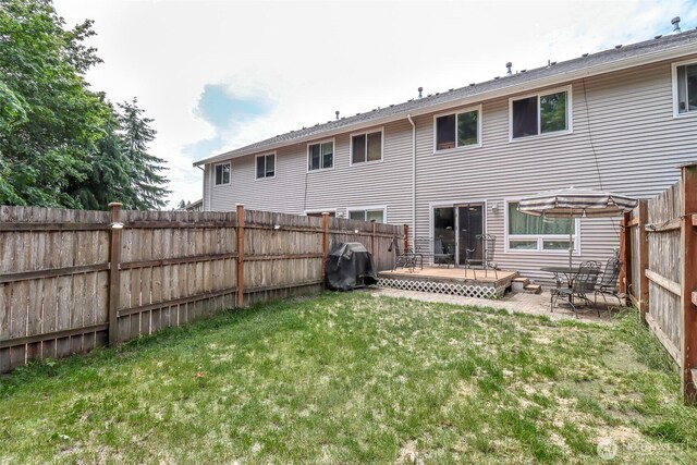 6530 Newaukum Pl NE, Bremerton, WA 98311 - rear view of property featuring a fenced backyard and a patio area