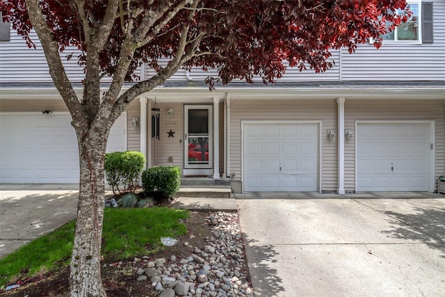6530 Newaukum Pl NE, Bremerton, WA 98311 - view of front of home featuring an attached garage and concrete driveway