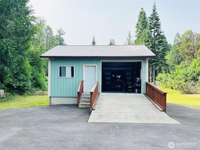 601 Mountain Trail Rd, Brinnon, WA 98320 - detached garage featuring asphalt driveway