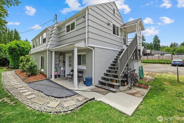 20102012 Dickinson Ave NW, Olympia, WA 98502 - view of property exterior featuring a patio area and stairs