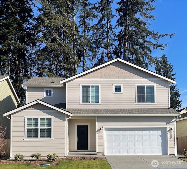 2309 158th Street Ct E, Tacoma, WA 98445 - view of front of house featuring a garage, driveway, and roof with shingles