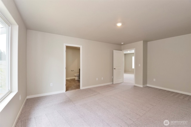 2309 158th Street Ct E, Tacoma, WA 98445 - spare room featuring light colored carpet and healthy amount of natural light