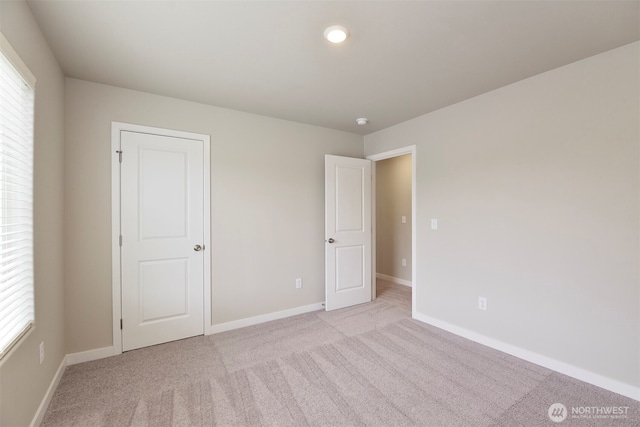 2309 158th Street Ct E, Tacoma, WA 98445 - unfurnished bedroom with light carpet, multiple windows, and recessed lighting