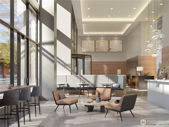 2510 6th Ave Unit 2306, Seattle, WA 98121 - building lobby with a towering ceiling, wooden walls, and recessed lighting
