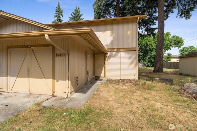 10423 13th Avenue Ct S, Tacoma, WA 98444 - view of property exterior featuring a yard