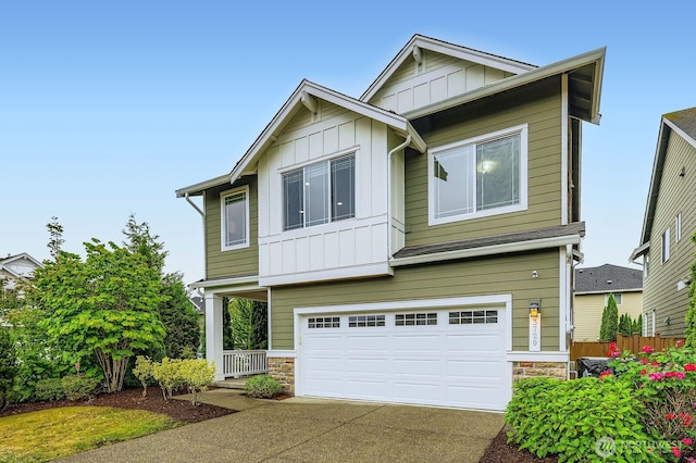 3720 195th Pl SE, Bothell, WA 98012 - craftsman-style home with board and batten siding, stone siding, a garage, and driveway