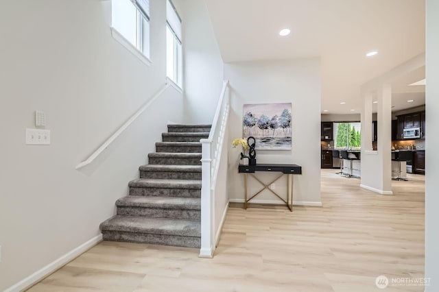 3720 195th Pl SE, Bothell, WA 98012 - stairs featuring wood finished floors and recessed lighting
