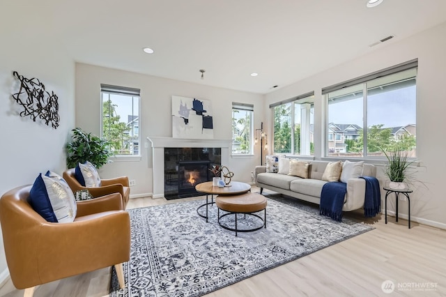 3720 195th Pl SE, Bothell, WA 98012 - living area with wood finished floors, a fireplace, and recessed lighting