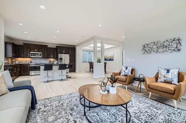 3720 195th Pl SE, Bothell, WA 98012 - living room featuring light wood finished floors and recessed lighting