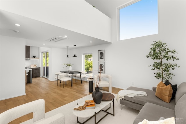 930 23rd Ave, Seattle, WA 98122 - living room featuring light wood finished floors and recessed lighting