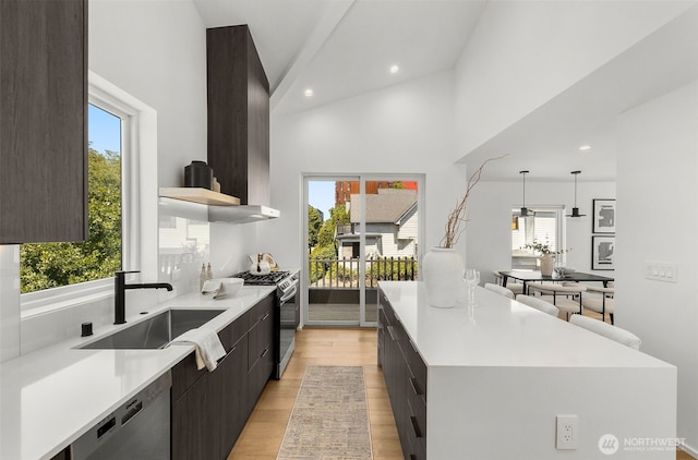 930 23rd Ave, Seattle, WA 98122 - kitchen featuring modern cabinets, appliances with stainless steel finishes, open shelves, a spacious island, and light countertops