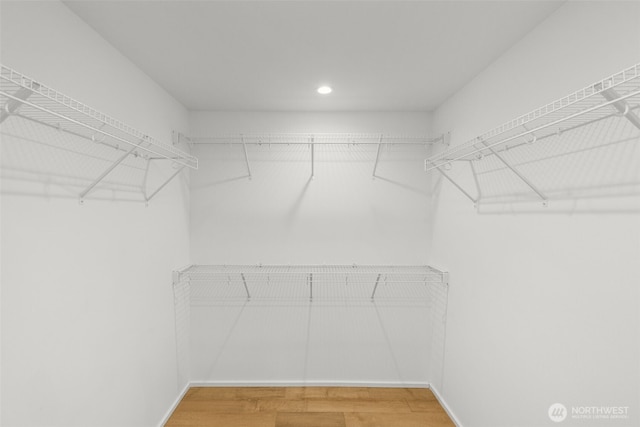 930 23rd Ave, Seattle, WA 98122 - walk in closet featuring wood finished floors