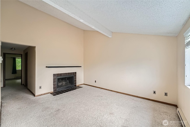 4802 S 187th Pl Unit A305, Seatac, WA 98188 - unfurnished living room featuring a baseboard radiator, carpet flooring, a textured ceiling, and a tile fireplace