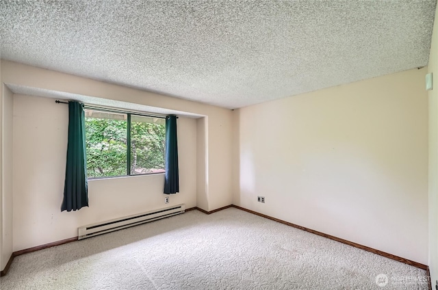 4802 S 187th Pl Unit A305, Seatac, WA 98188 - carpeted spare room featuring a baseboard radiator and a textured ceiling