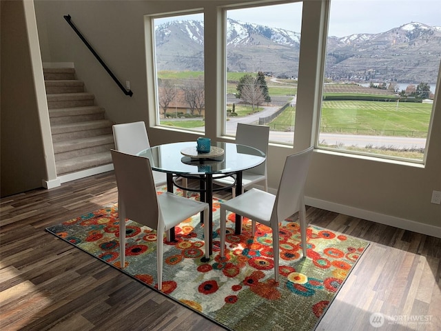 217 San Remo Ln, Chelan, WA 98816 - dining room with healthy amount of natural light, wood finished floors, and stairs