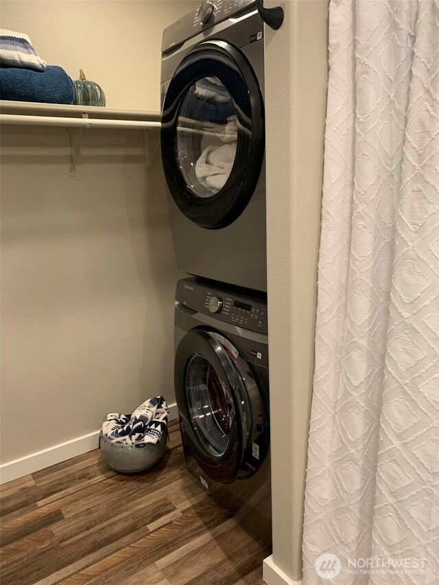 217 San Remo Ln, Chelan, WA 98816 - laundry room with estacked washer and dryer and wood finished floors