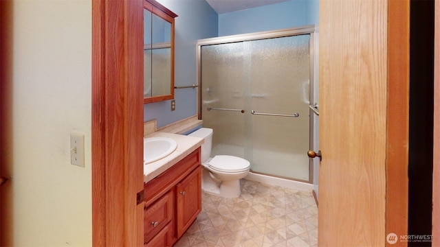 424 14th St # 202, Bellingham, WA 98225 - bathroom featuring vanity, a shower stall, and tile patterned floors