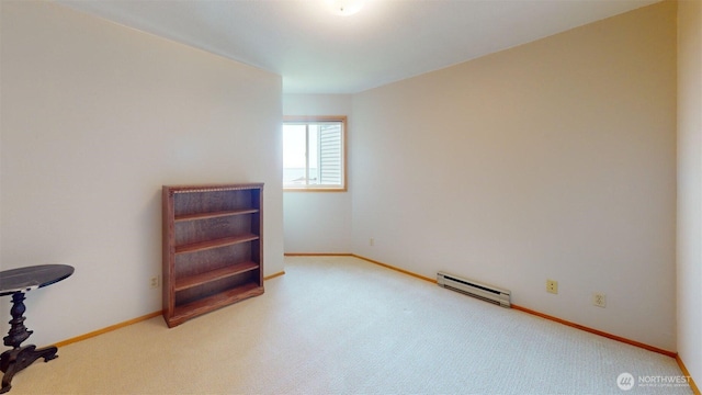 424 14th St # 202, Bellingham, WA 98225 - unfurnished room featuring a baseboard radiator and carpet floors