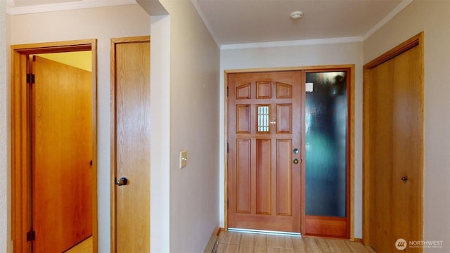 424 14th St # 202, Bellingham, WA 98225 - foyer featuring crown molding and light wood finished floors