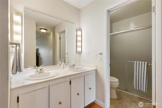2565 Dexter Ave N Unit 103, Seattle, WA 98109 - full bathroom with double vanity and a shower with door