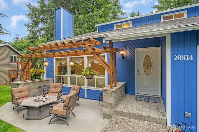 20814 28th Ave SE, Bothell, Bothell, WA 98021 - property entrance featuring a pergola, a shingled roof, a patio area, and a chimney