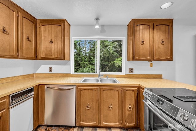 20814 28th Ave SE, Bothell, Bothell, WA 98021 - kitchen with stainless steel appliances, light countertops, and brown cabinets