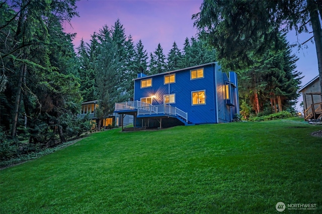 20814 28th Ave SE, Bothell, Bothell, WA 98021 - rear view of property with stairway, a wooden deck, a yard, and a chimney