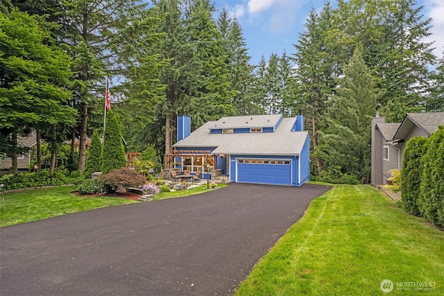 20814 28th Ave SE, Bothell, Bothell, WA 98021 - view of front of house featuring asphalt driveway, a front yard, and a chimney