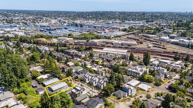 3421 23rd Ave W, Seattle, WA 98199 - aerial view of residential area featuring a nearby body of water, property parcel outlined, and a marina