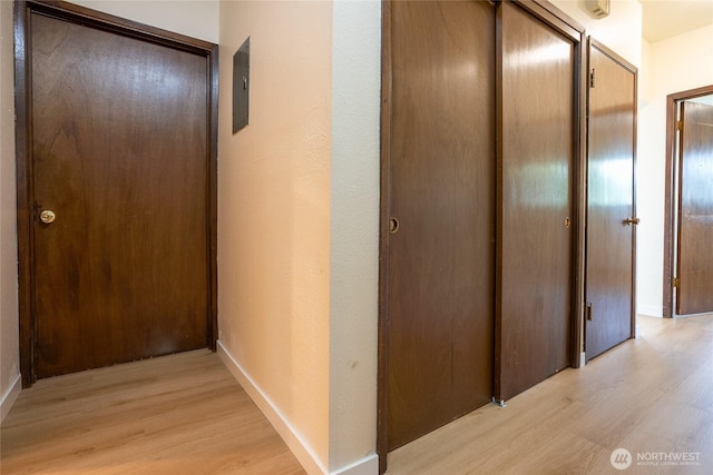 3421 23rd Ave W, Seattle, WA 98199 - hall featuring light wood-style floors and baseboards