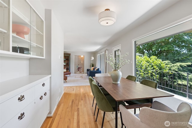 2322 Browns Point Blvd NE, Tacoma, WA 98422 - dining space with light wood-type flooring and baseboards
