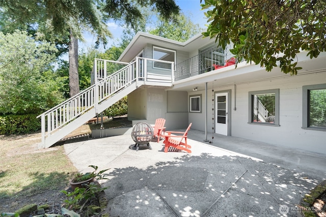 2322 Browns Point Blvd NE, Tacoma, WA 98422 - view of patio / terrace featuring a fire pit and stairway