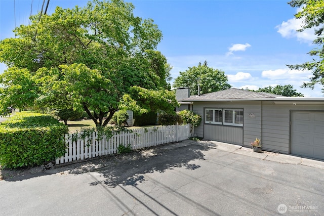 2322 Browns Point Blvd NE, Tacoma, WA 98422 - view of property exterior featuring a chimney