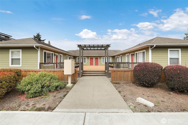9013 16th Ave SW Unit 8, Seattle, WA 98106 - view of home's community featuring a wooden deck and a pergola