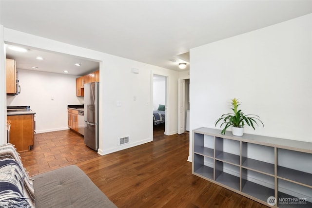 9013 16th Ave SW Unit 8, Seattle, WA 98106 - living area featuring recessed lighting and dark wood finished floors