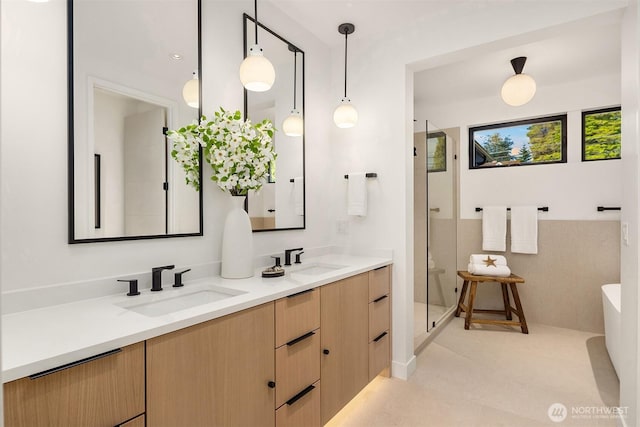 7008 29th Ave NE, Seattle, WA 98115 - bathroom with a shower stall, double vanity, and a soaking tub