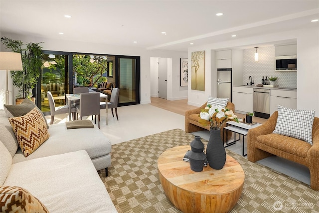 7008 29th Ave NE, Seattle, WA 98115 - living room featuring recessed lighting and light carpet