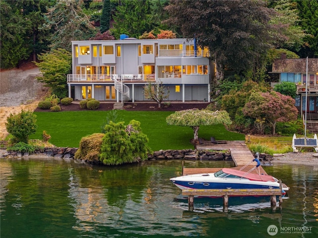 5438 E Mercer Way, Mercer Island, WA 98040 - rear view of property with a balcony, boat lift, a water view, and a lawn