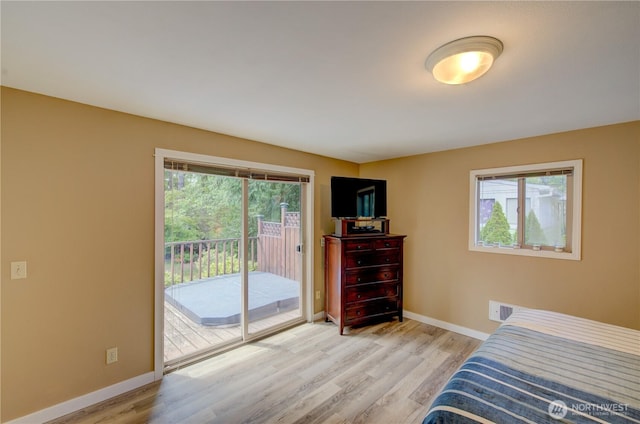 27521 U St, Ocean Park, WA 98640 - bedroom featuring access to outside and light wood-style flooring