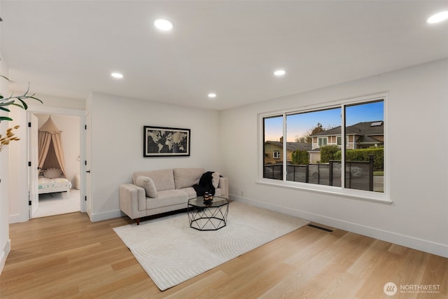 4839 S Holly St, Seattle, WA 98118 - living room featuring light wood-type flooring and recessed lighting