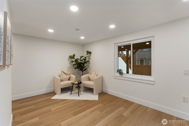 4839 S Holly St, Seattle, WA 98118 - living area with light wood-style floors and recessed lighting