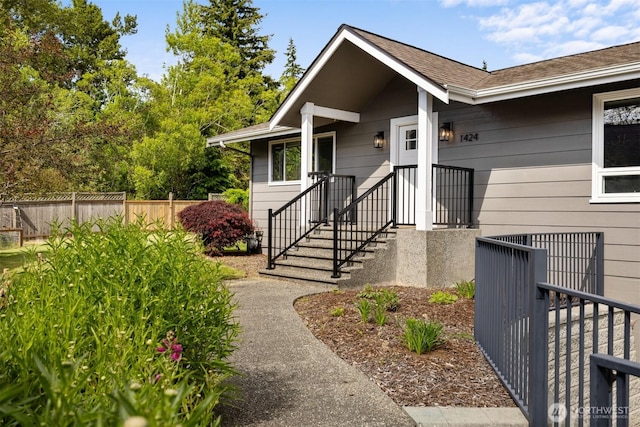 1424 E 36th Ln, Bellingham, WA 98226 - doorway to property featuring roof with shingles