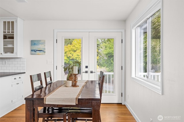 1424 E 36th Ln, Bellingham, WA 98226 - dining space with french doors, plenty of natural light, and light wood-style flooring