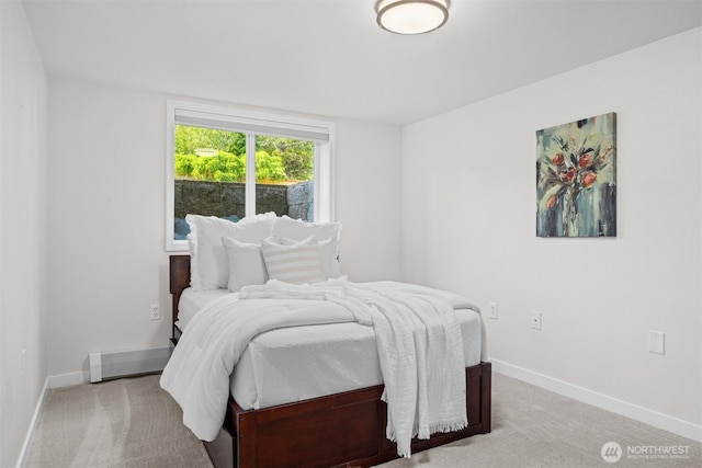1424 E 36th Ln, Bellingham, WA 98226 - bedroom with light colored carpet and a baseboard radiator