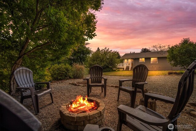 1424 E 36th Ln, Bellingham, WA 98226 - patio terrace at dusk featuring a fire pit