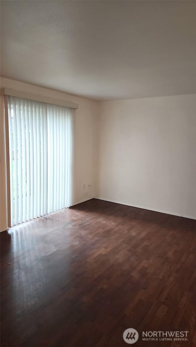 402 4th St SE, Auburn, WA 98002 - empty room featuring dark wood finished floors