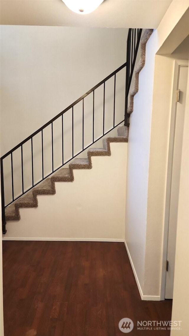 402 4th St SE, Auburn, WA 98002 - stairs featuring wood finished floors and baseboards