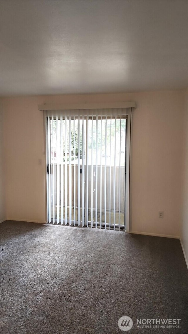 402 4th St SE, Auburn, WA 98002 - spare room featuring carpet