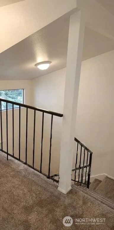 402 4th St SE, Auburn, WA 98002 - staircase with carpet and baseboards